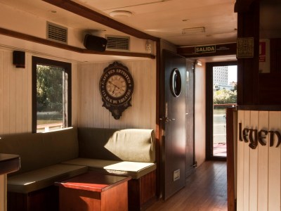 a room filled with furniture and a large window