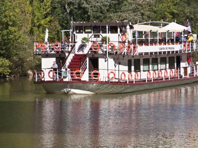 a boat is docked next to a body of water