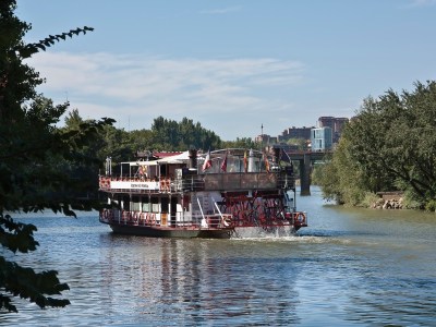 a small boat in a large body of water