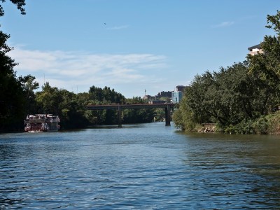 a large body of water surrounded by trees