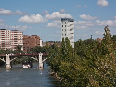 a bridge over a river in a city