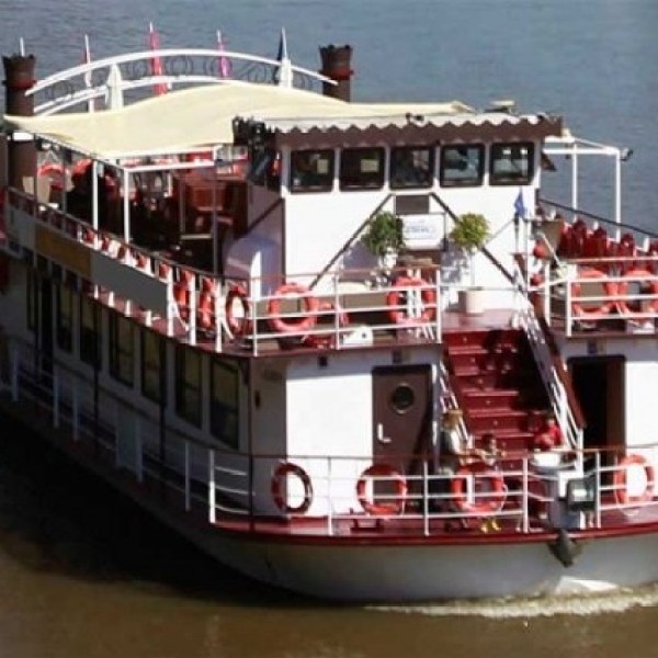 a small boat in a large body of water