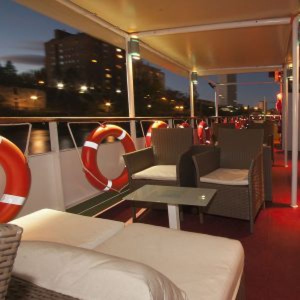 a room filled with furniture and a large window