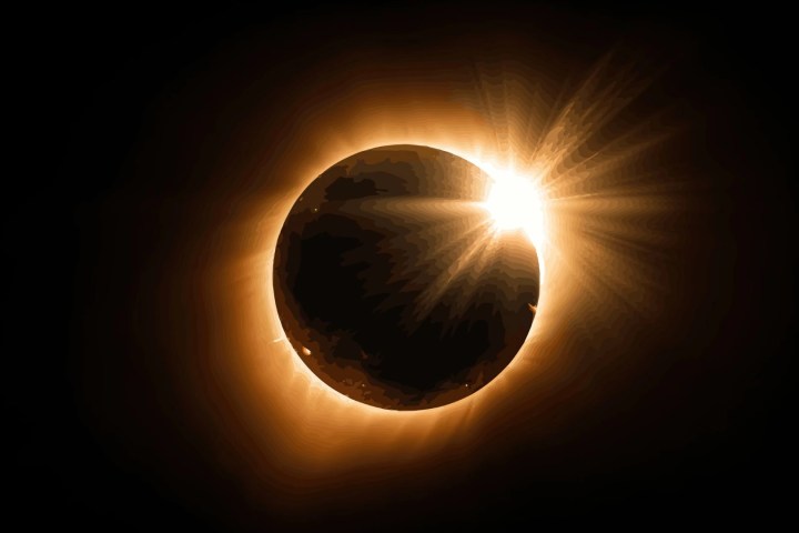 A solar eclipse with the sun's rays peeking behind the moon.
